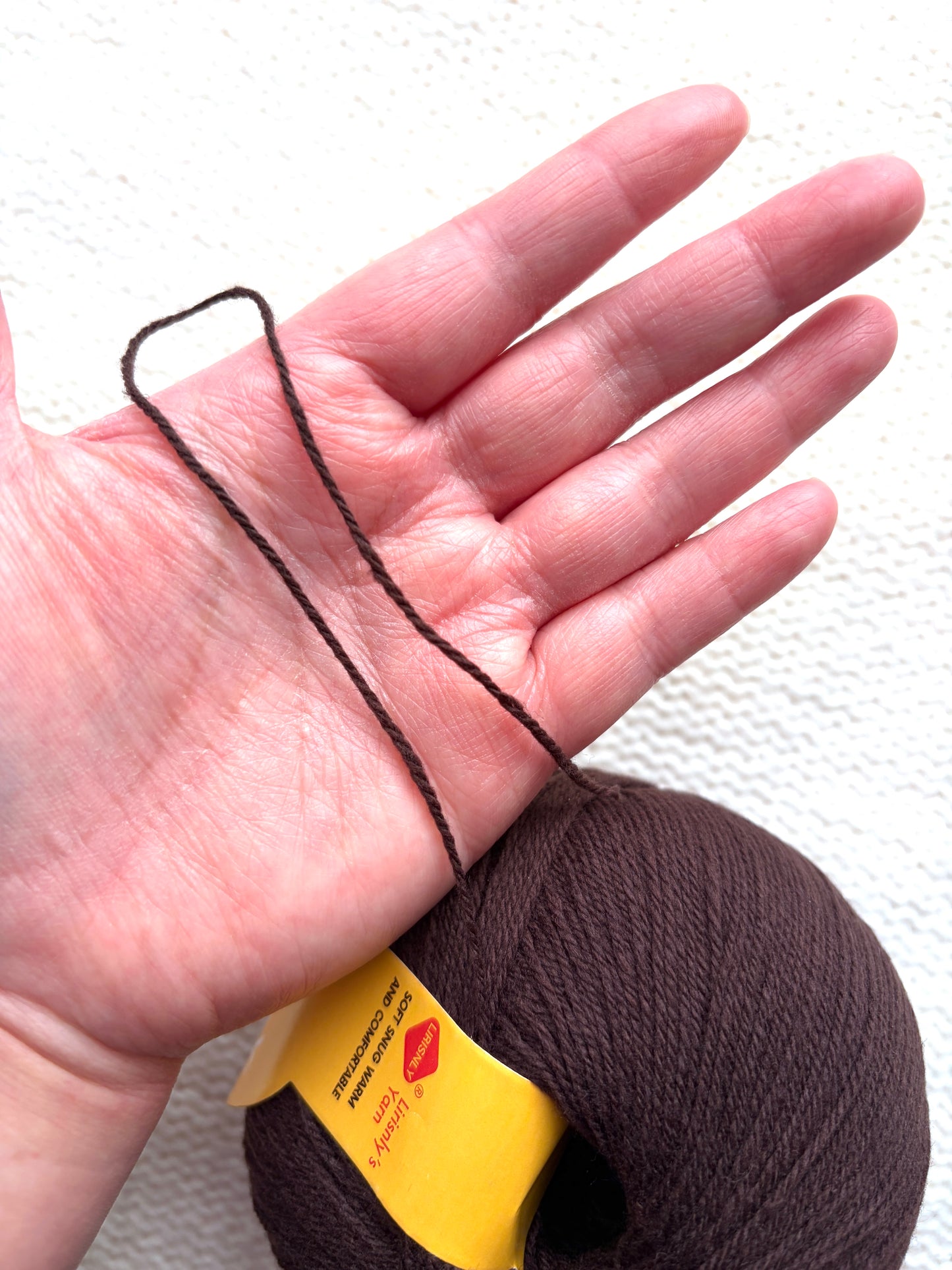 4 balls x 50g Cashmere yarn : 95% Cashmere + 5% Acrylic : 38 Walnut Brown