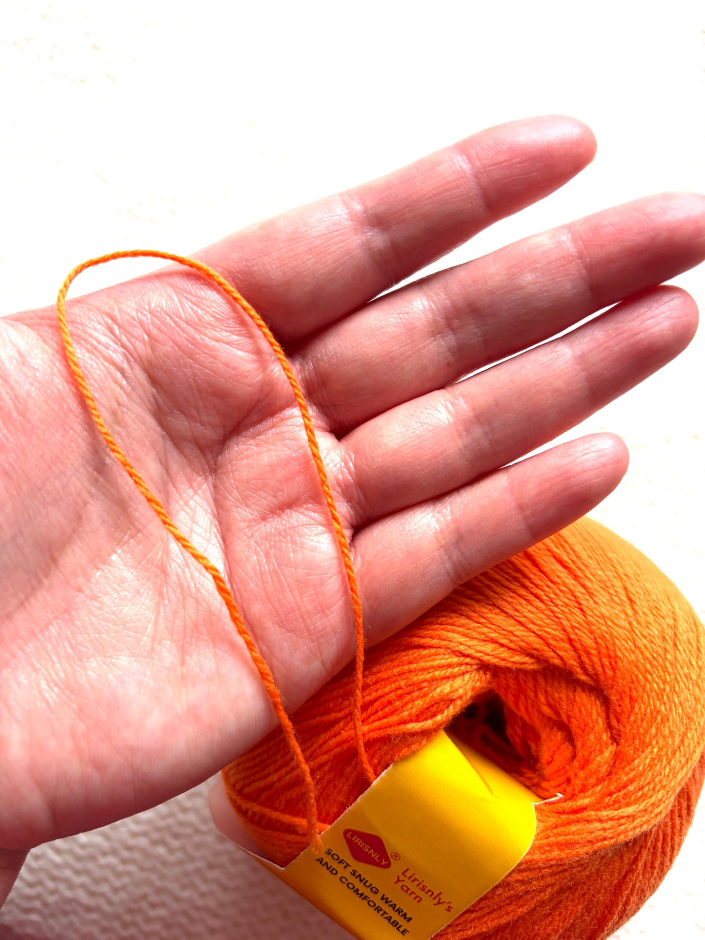 4 balls x 50g Cashmere yarn : 95% Cashmere + 5% Acrylic : 44 Blaze Orange