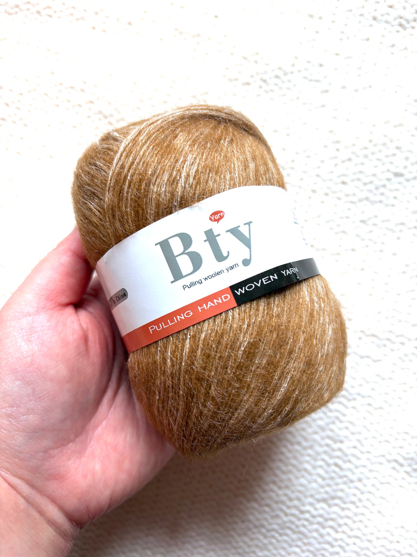 3 balls x 50g 95% Cashmere yarn : 95% Cashmere + 5% Acrylic : 15 Caramel Brown