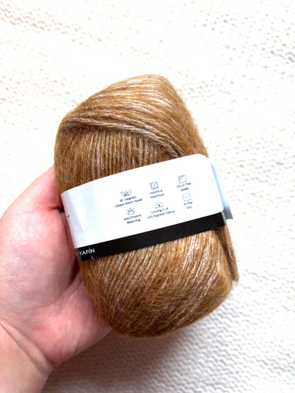 3 balls x 50g 95% Cashmere yarn : 95% Cashmere + 5% Acrylic : 15 Caramel Brown