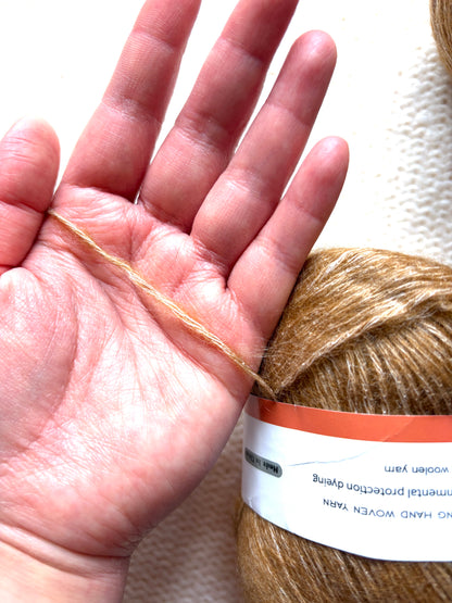 3 balls x 50g 95% Cashmere yarn : 95% Cashmere + 5% Acrylic : 15 Caramel Brown