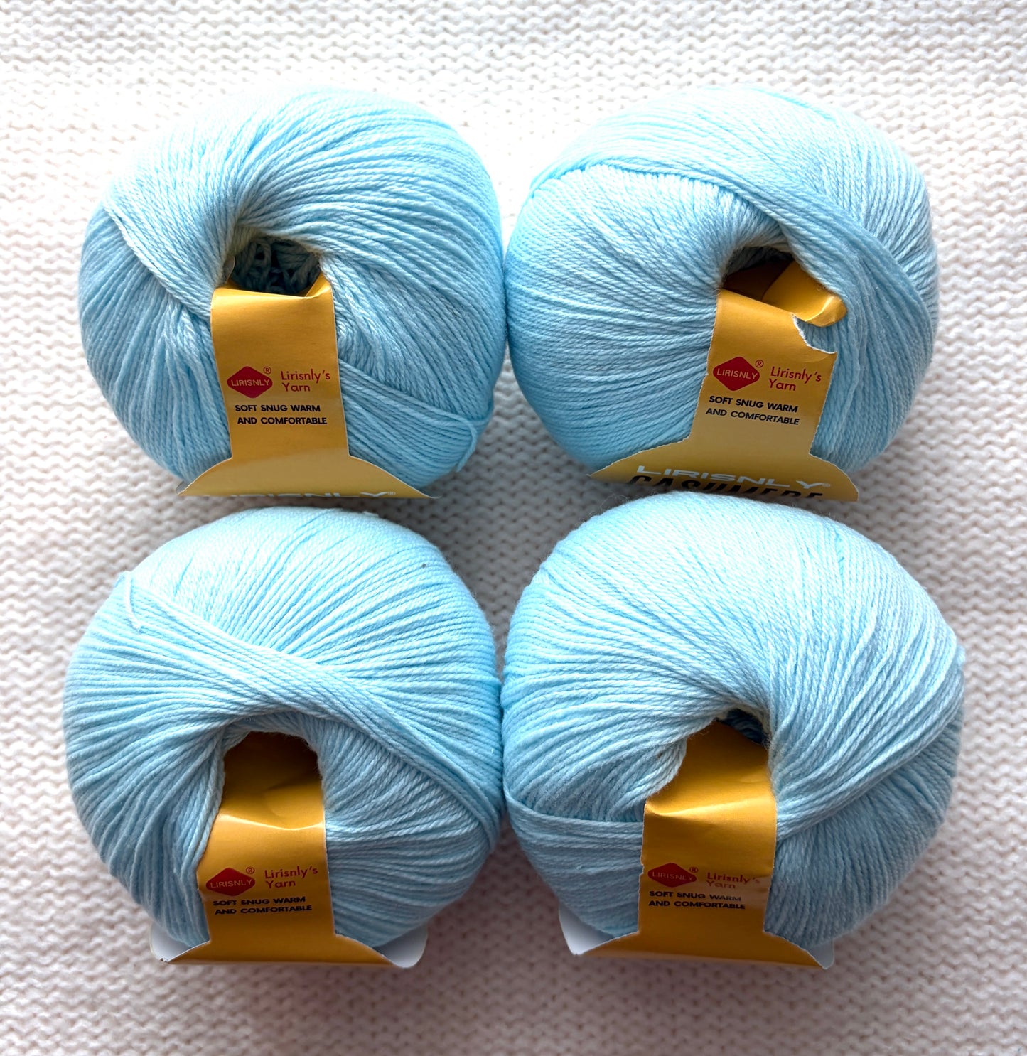 4 balls x 50g Cashmere yarn : 95% Cashmere + 5% Acrylic : 33 Light Blue