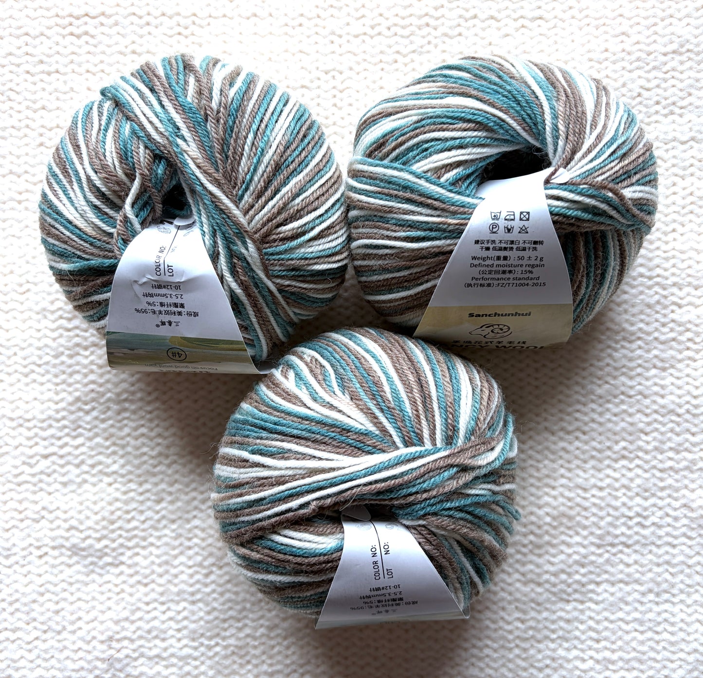 3 balls x 50g Fancy Wool Blend  yarn : 95% Wool : Colour 07 Coastal Breeze