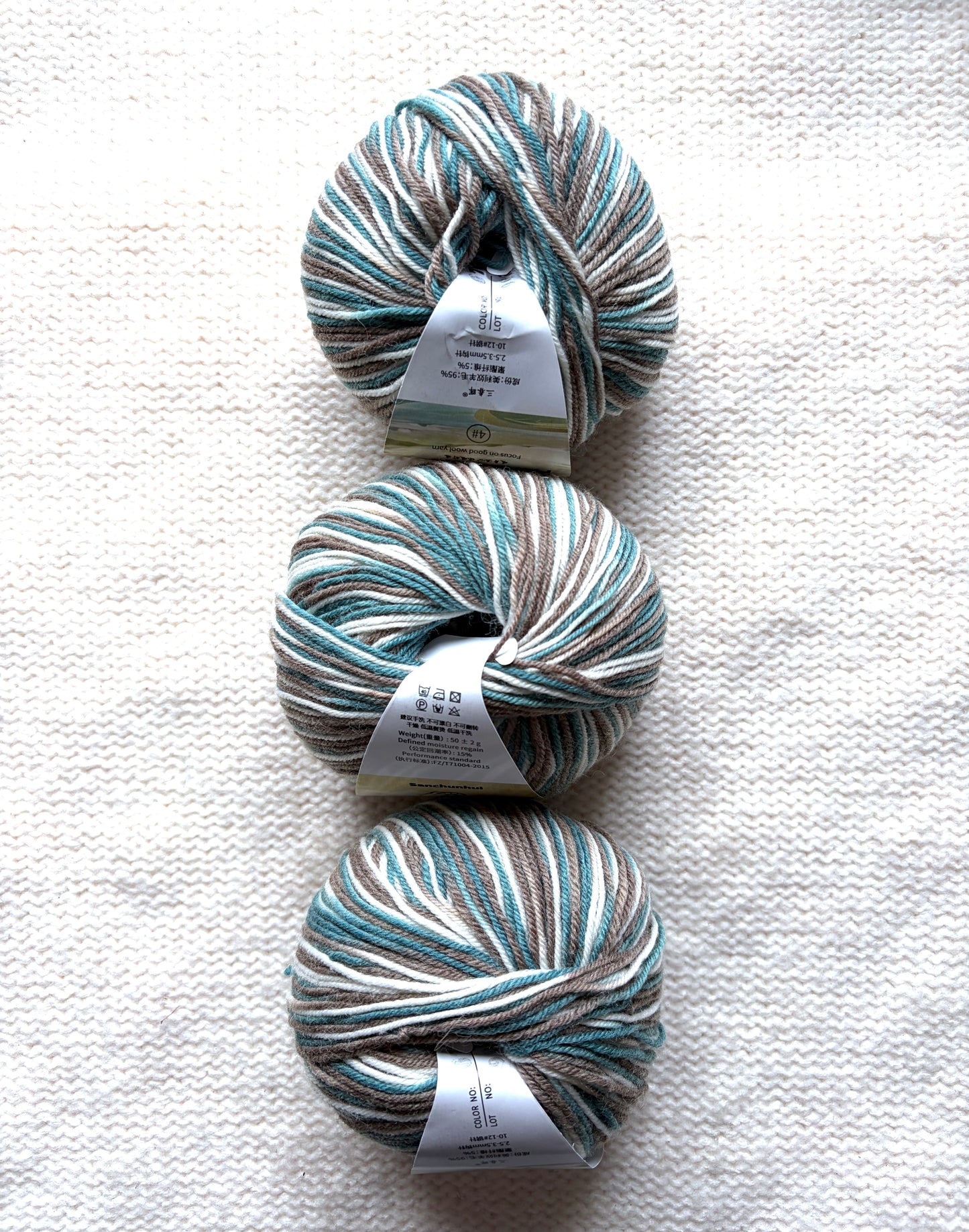 3 balls x 50g Fancy Wool Blend  yarn : 95% Wool : Colour 07 Coastal Breeze