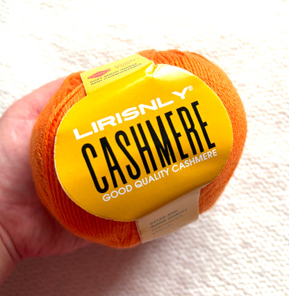 4 balls x 50g Cashmere yarn : 95% Cashmere + 5% Acrylic : 44 Blaze Orange