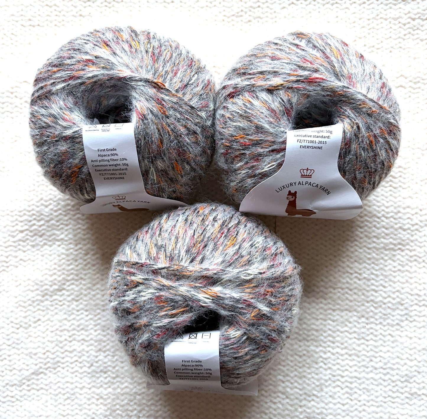 3 balls x 50g Alpaca yarn : 90% Alpaca + 10% Anti Pilling Fiber : 10 Grey